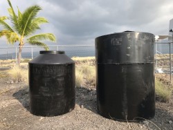 290 gallon and 500 gallon water tanks on the Big Island